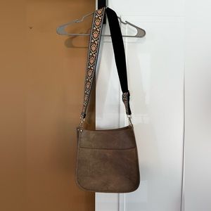 Satchel with guitar strap